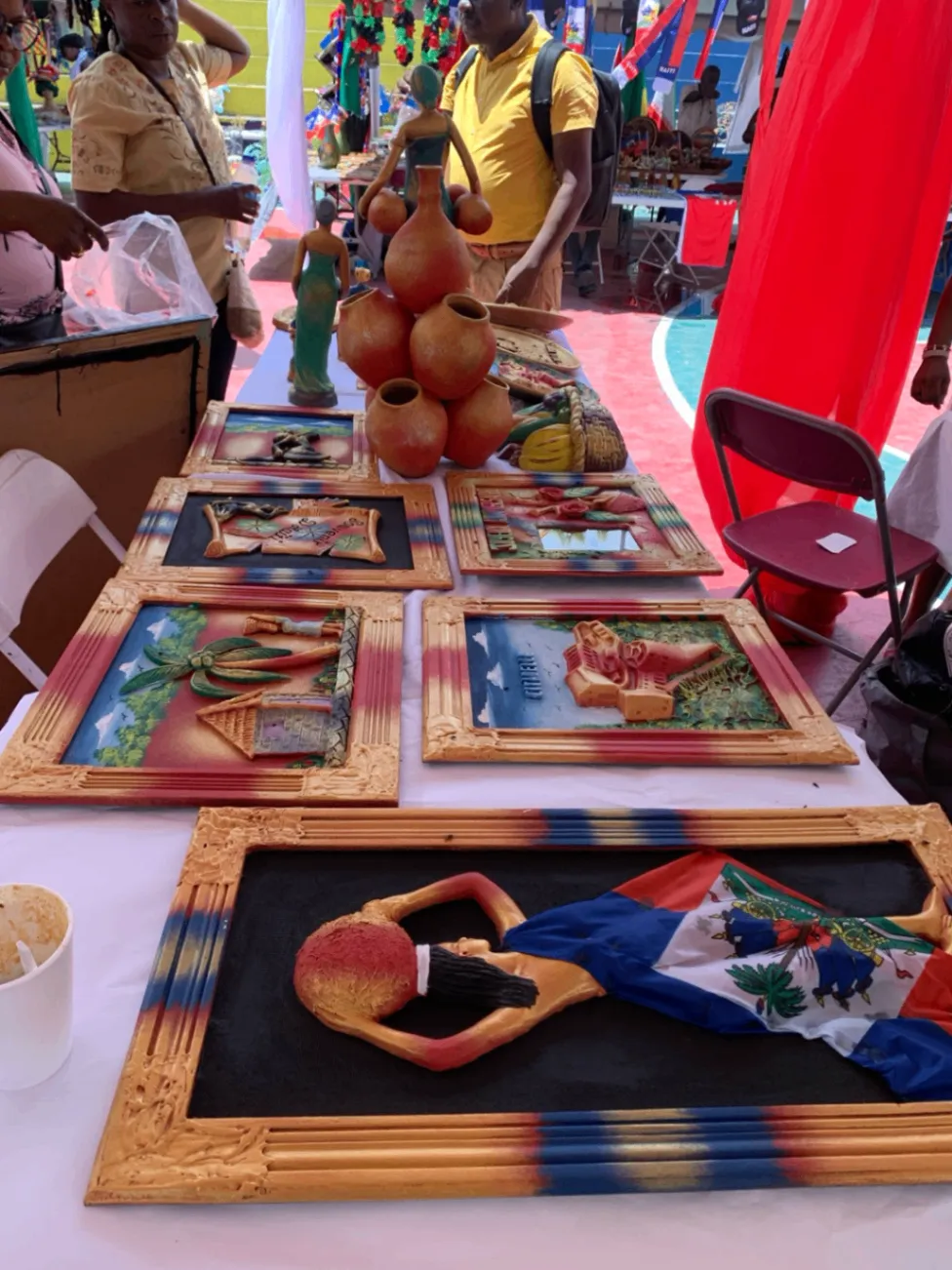 Handcrafted Haitian art and cultural goods at a community market